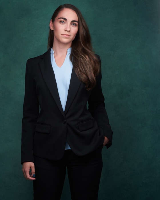 Portrait photography example showing more of the subject's body and environment